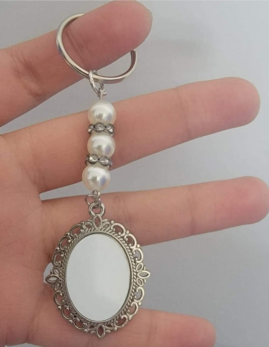 OVAL PEARL CHARM KEYCHAIN  WITH OVAL DISC