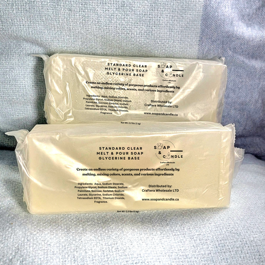 Two sealed pale translucent-looking blocks labelled Standard Clear Melt & Pour Soap Base