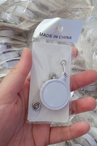 Sublimation Badge reels front view - Sublimation Blank Canada | WestCoastCraft