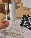 White 20 oz straight tumbler beside clear straw and black circular pieces