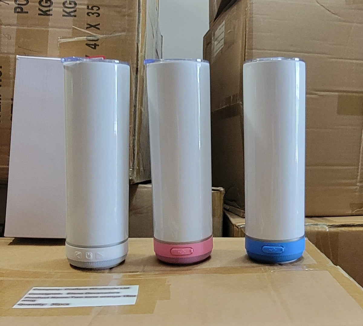 White speaker tumblers with white pink and blue lower modules