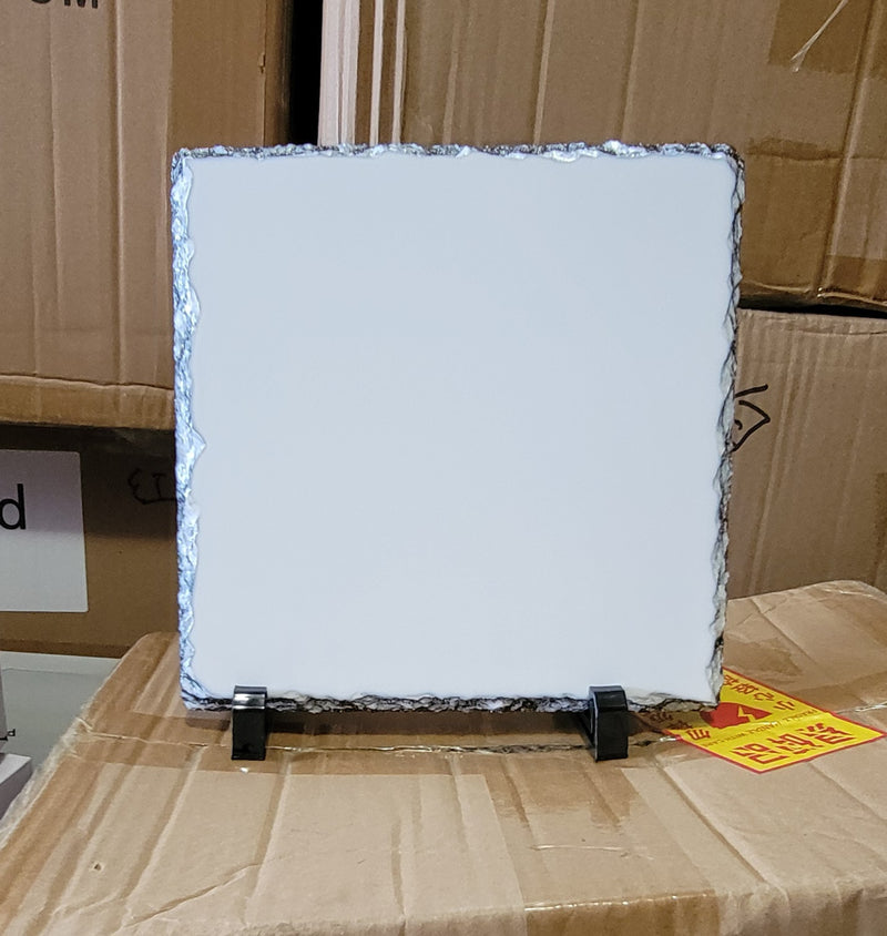 White rectangular rock slate display with rough dark edge