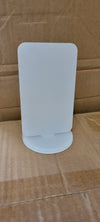 close view of clear rounded-bottom panel in stand.
