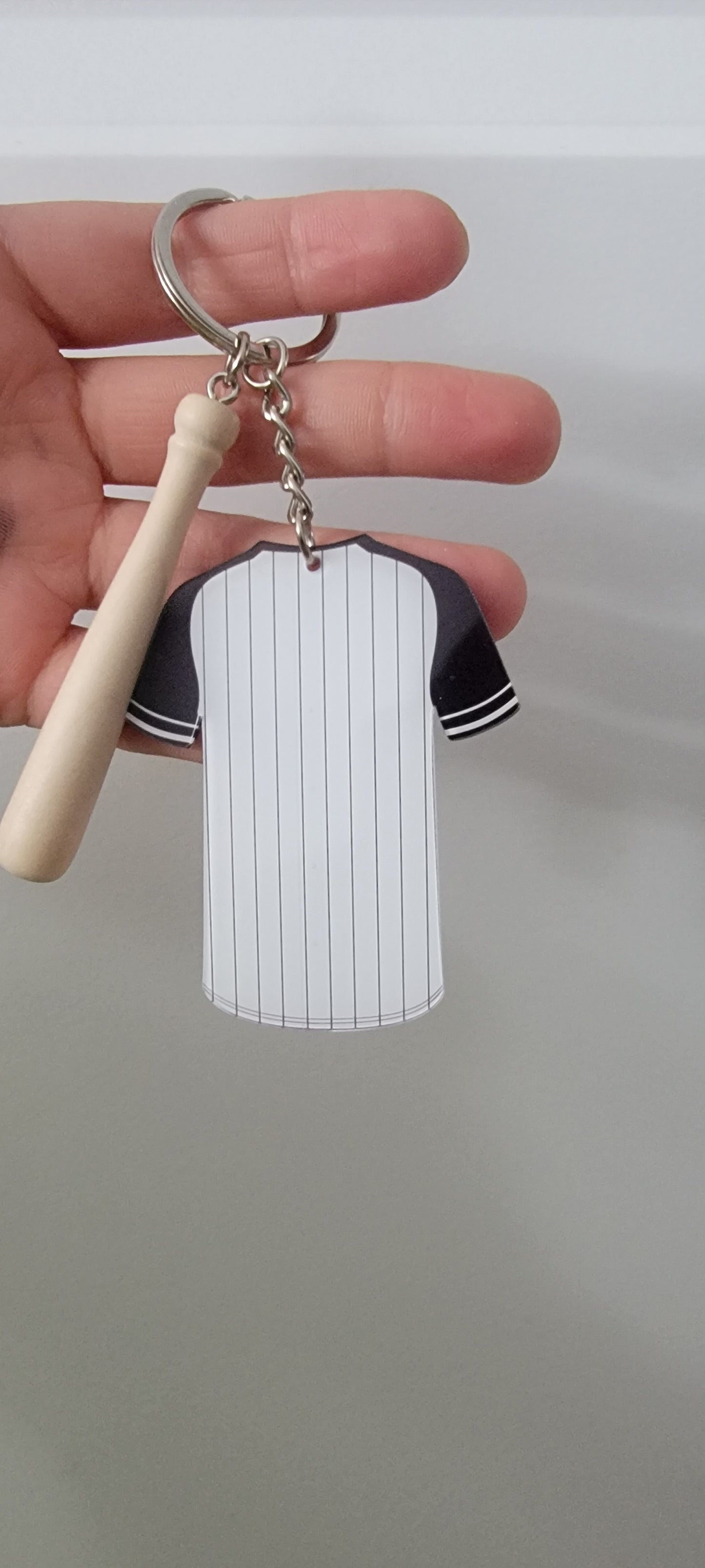 Acrylic baseball jersey with baseball bat