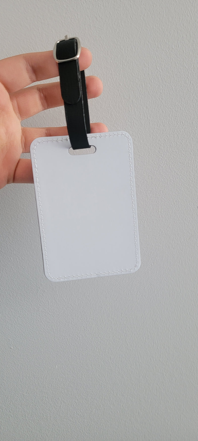 Sublimation Leather Bag Tag Blank White - Rectangle Luggage Tag with Black Strap Held in Hand - Custom Heat Press Printable Travel Accessory - Personalized ID Tag Gift Wholesale Canada