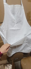 White Polyester Sublimation Apron Blank Held Up for Display - Premium Custom Kitchen Apron Showing Full Size and Shape - Quality Chef Apron for Heat Press Personalization - Wholesale Sublimation Canada